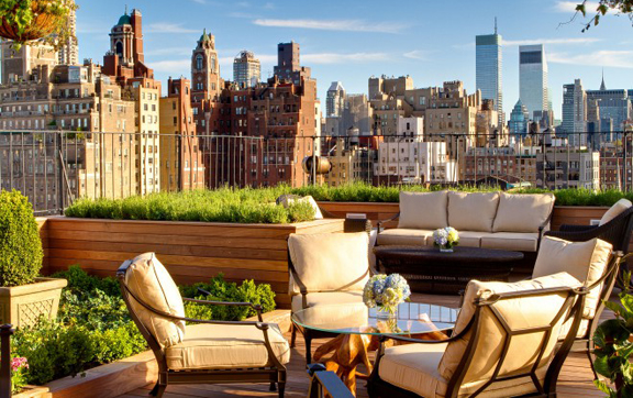 A picture of the rooftop bar and restaurant and its view of New York City at The Surrey, New York, USA