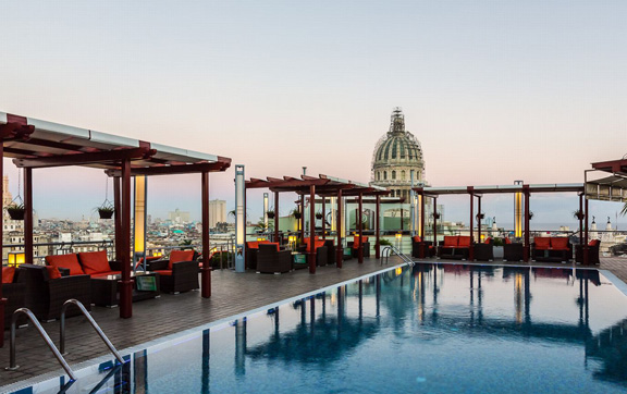 The rooftop pool, restaurants and stunning view at Saratoga, Cuba.